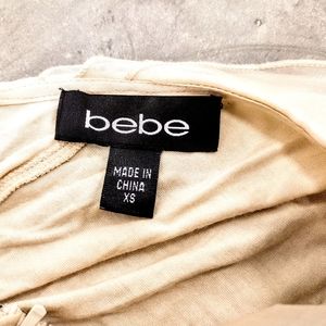 Bebe designer cream chiffon blouse with black ribbon tie